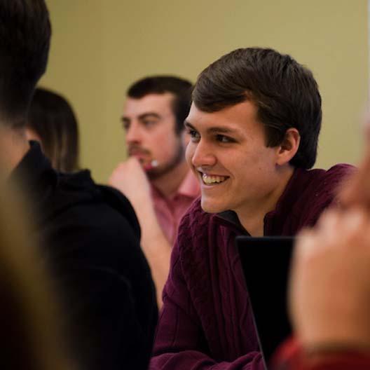 Student smiling in class